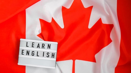 The National Flag of Canada. Lightbox with text LEARN ENGLISH Canadian Flag or the Maple Leaf.