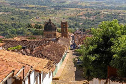 View down to the center of historic town Barichara and green surrounding, Colombia, South America