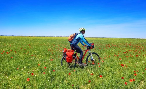 Biker by Camino de Santiago in bicycle at Saint James Way of Levante of Spain