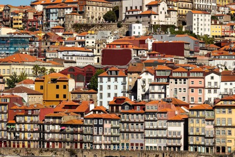 Colorful Houses of Porto Ribeira, Traditional Facades. Old Buildings with Red Roof Tiles in the