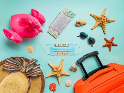 Coronavirus covid-19 and travel concept. Summer vacation and beach rest symbols and breathing mask