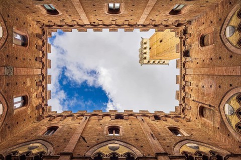 Detail of the Palazzo Pubblico town hall in Siena, Italy, Europe