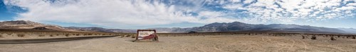 Panorama of Death Valley NP Sign with cloudy sky