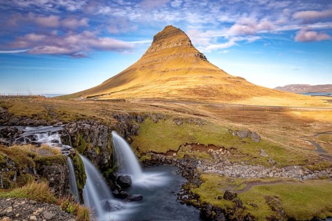 Waterfall in front of the mountain Kirkjufell, Iceland, Europe