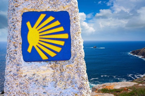 End of Saint James Way sign of Finisterre in Galicia Spain photomount