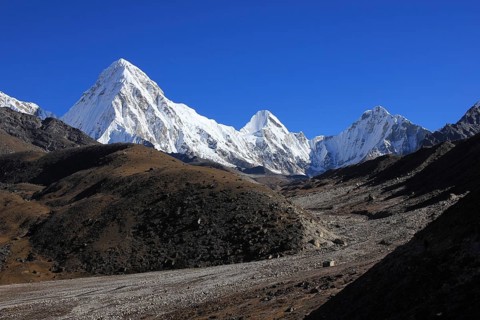 Snow covered Mount Pumo Ri and distant view of the Everest Base Camp, Nepal, Asia