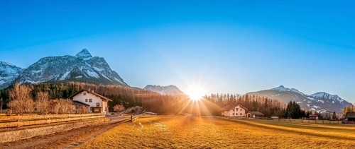 Beautiful mountain landscape with a small village, called Ehrwald, located at the foot of the