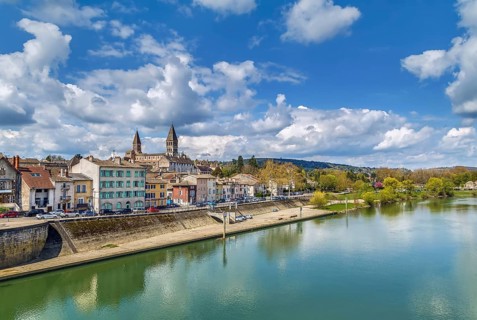 View of Tournus with abbey fron Saone river, France, Europe