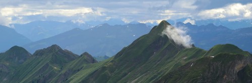 Cloud hanging on Mount Tannhorn and Rothorn Ridge, Switzerland, Europe