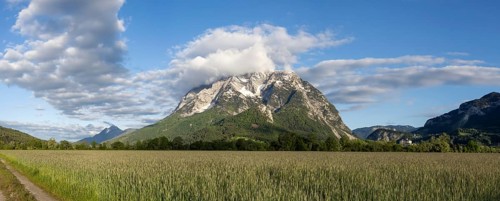 Cloudy mood over mountain peak, Grimming, panoramic shot, near Irdning, Styria, Austria, Europe
