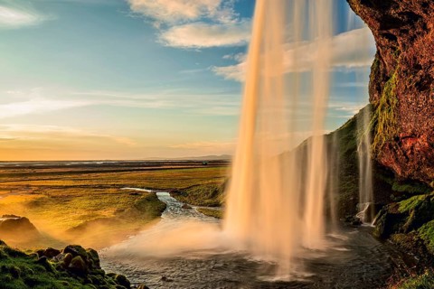 Seljalandsfoss waterfall at sunset in summertime, Iceland, Europe