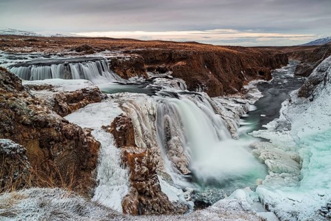 Panoramic view of Reykjafoss waterfall. Varmahlid river in Northern Iceland in winter