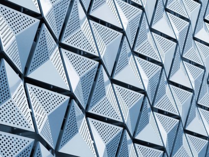 Blue toned metallic geometric architectural cladding panels