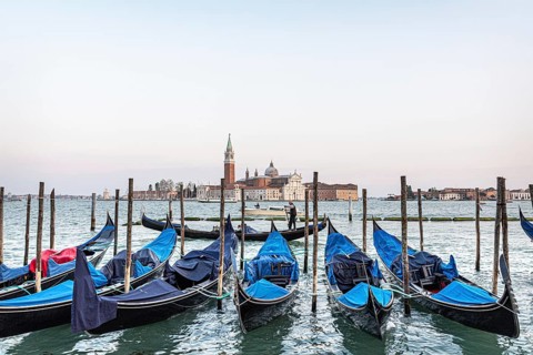 Gondolas tied up for the night, with Church San Giorgio Maggiore, Venice, Italy, Europe