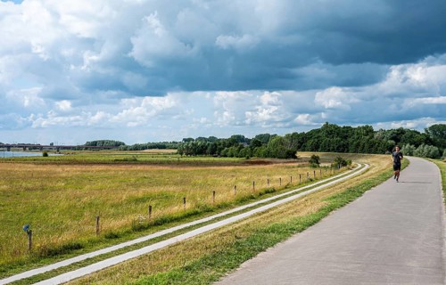 Zwolle, Overijssel, The Netherlands, 07 15 2022, Bicycle path at the dike of the River Ijssel flood