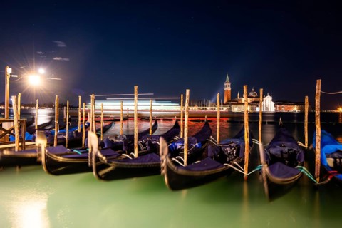 Venetian gondolas, boat mooring at St Mark's Square, church of San Giorgio Maggiore in the