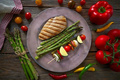 Grilled chicken breast with brochette vegetable with grill asparagus