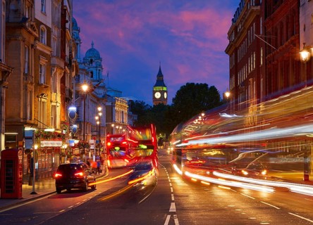 London Big Ben from Trafalgar Square traffic lights at sunset