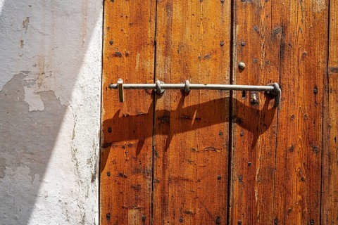 Ibiza Eivissa downtown Dalt Vila wooden door in Balearic Islands