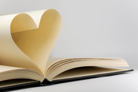 Book with two pages in a heart shape