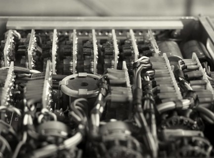 Monochrome selective focus image of complex colored wiring and connectors joining circuit boards