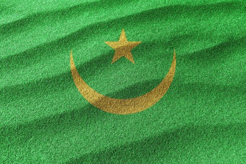 Mauritania sand flag, national flag sand background