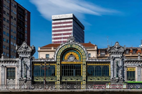 Bilbao, Spain, February 13, 2022: Bilbao-Concordia railway station on the riverside of the estuary