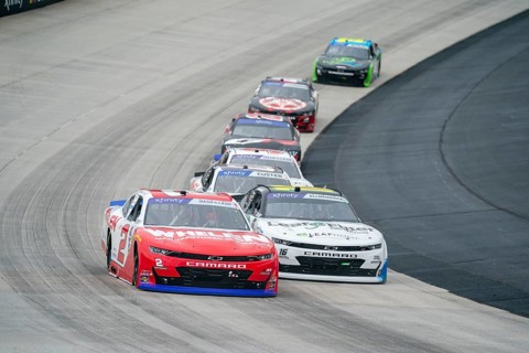 Jesse Love races for position for the BetRiver 200 in Dover, DE, USA, North America