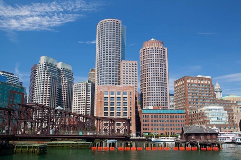 Boston skyline and Northern Avenue Bridge. Built in 1908, it was closed to vehicle traffic in 1999