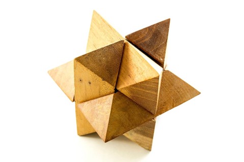 Wooden puzzle isolated on a white background