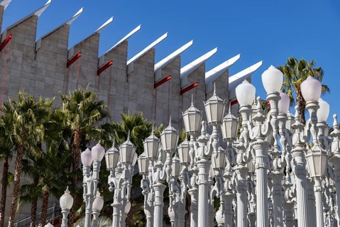 A picture of Urban Light, a public art designed by Chris Burden and unveiled in 2008, next to the