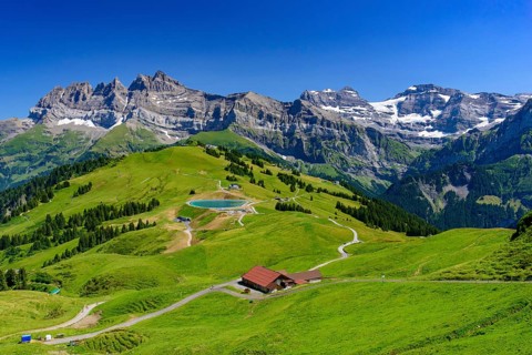 Landscape of mountains of Alps in summer with green meadow in Portes du Soleil, Switzerland, Europe