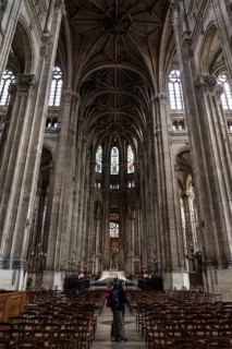 PARIS, FRANCE, MAY 24, 2022, Tall columns and beautifully ornate ceiling in the gothic church Saint