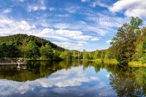 View at a lake in the Spiesswoogtal valley near the German village Fischbach bei Dahn in the