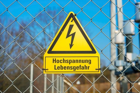 Yellow sign High voltage Danger to life