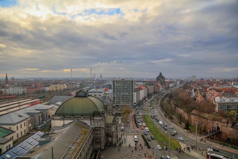 Bird's eye view of the main railway station, Frauentorgraben with opera house and city wall,