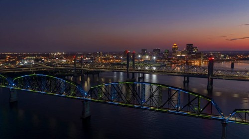 Multi Colors of light hit the Big Four bridge before sunrise around Lousville Kentucky