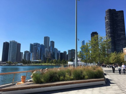 Walkway along the water with a view of modern skyscrapers, chicago, illinois, usa