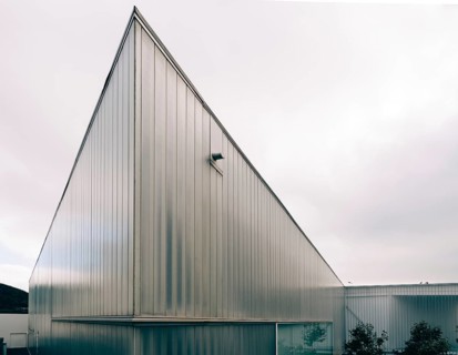 Angra do Heroismo, Portugal, July 1, 2022: New building of modern architecture with U-glass facade