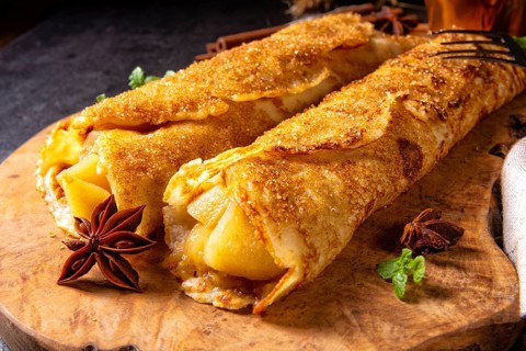 Tasty autumnal omas pancakes with apple and cinnamon