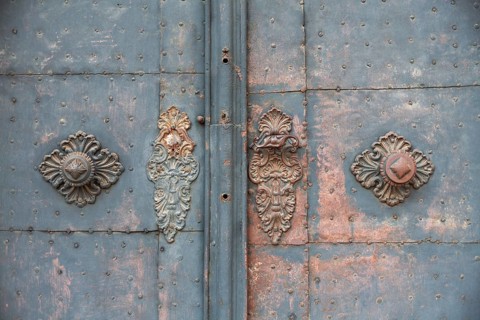 Door handle, ornate wrought ironwork, church door of the Church of the Merciful Brothers, Graz,