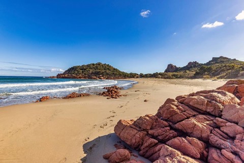 Bay with beautiful beach and sea in the sunshine, Spiaggia di Su Sirboni, Ogliastra, Sardinia,