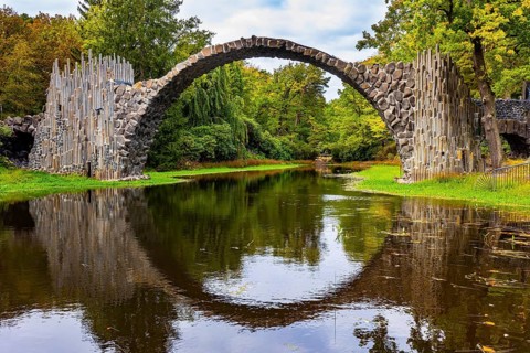 The Devil's Bridge on the Rakots River. The basalt columns of the bridge form a perfect circle with