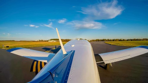 A small general aviation aircraft, its pre-takeoff checklist complete, taxis carefully to the