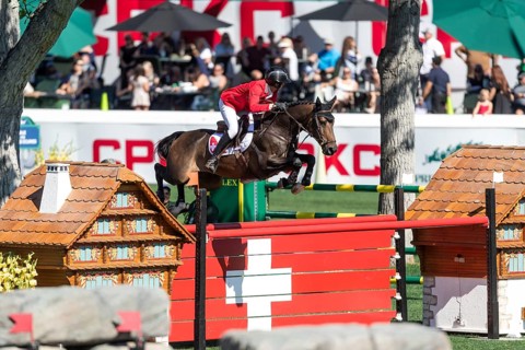 Martin Fuchs of Switzerland, riding Commissar Pezi competes in the BMO Nations Cup during the CSIO