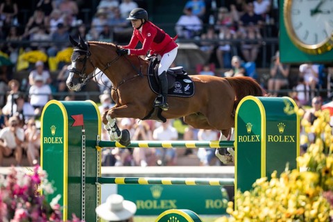Erynn Ballard of Canada and riding De Flor 111 Z Santa Rosa compete in the first round of the 1.60m