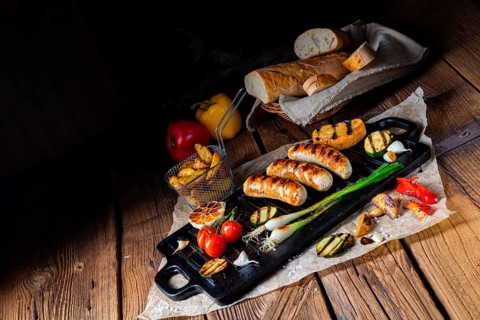 Delicious grilled sausage with various grilled vegetables