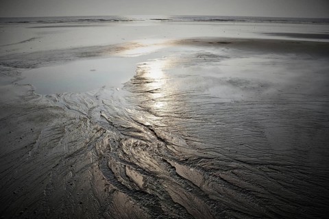 Sand pattern on beach at low tide, Bhagal Beach, Gujarat, India, Asia