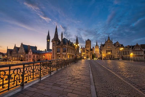 Ghent Belgium, city skyline night at St Michael's Bridge (Sint-Michielsbrug) with Leie River and