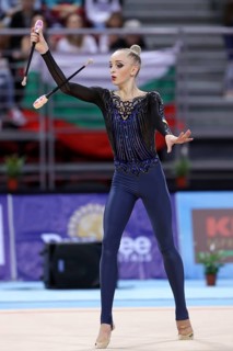 Sofia, Bulgaria - 1 April, 2018: Olena Diachenko Ukraine performs with clubs during Rhythmic